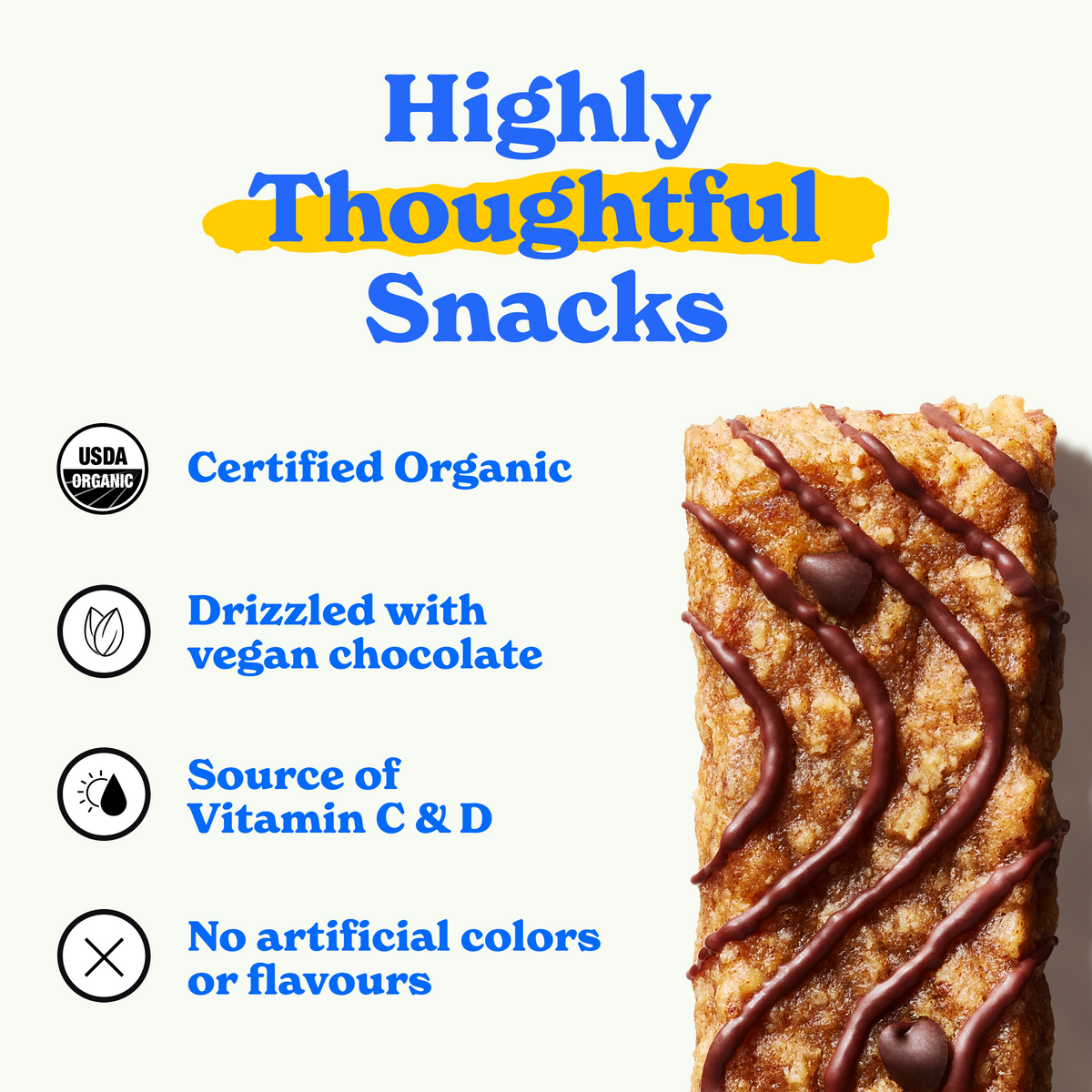 A chocolate chip soft-baked bar with white icing drizzle is shown on the right side. On the left, bold blue and yellow text reads "Highly Thoughtful Snacks." Below, icons with text highlight key features: "Certified Organic," "Drizzled with vegan chocolate," "Source of Vitamin C & D," and "No artificial colors or flavours.