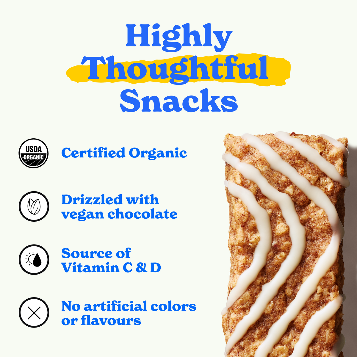 A cinnamon bun soft-baked bar with white icing drizzle is shown on the right side. On the left, bold blue and yellow text reads "Highly Thoughtful Snacks." Below, icons with text highlight key features: "Certified Organic," "Drizzled with vegan chocolate," "Source of Vitamin C & D," and "No artificial colors or flavors.