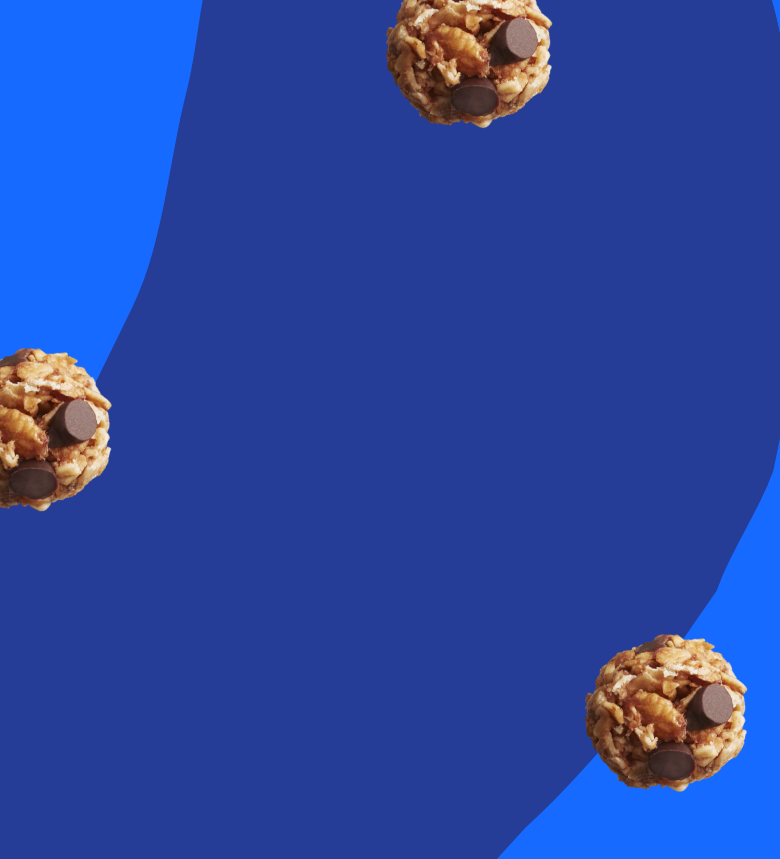 Background of blue abstract shapes, overlaid with scattered MadeGood granola bites.
