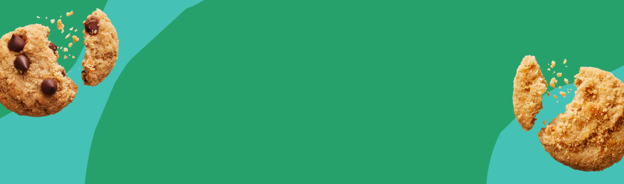 Cookies with chocolate chips on a green abstract background.