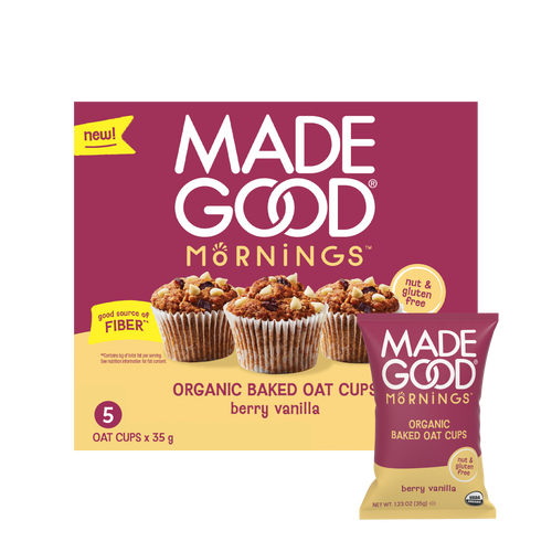 Packaging of "Made Good Mornings" organic baked oat cups in berry vanilla flavor. Features images of oat cups, labeled as nut and gluten-free, with a focus on being a good source of fiber.